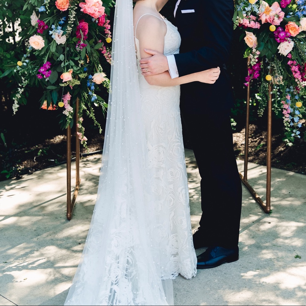 Cathedral length tulle veil with scattered pearls
